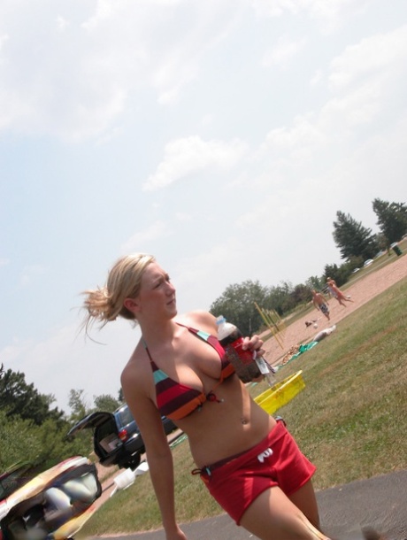 blonde with huge tits racing in to the beach hot xxx image